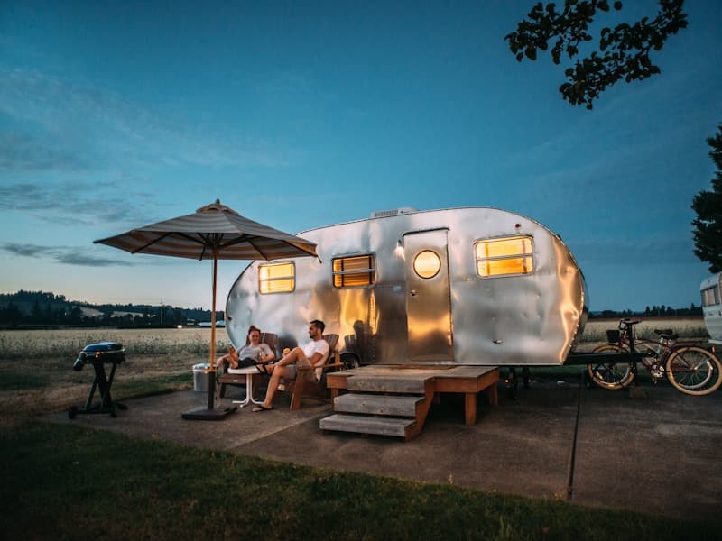 Campervan parked beside a lake on the South Island of New Zealand